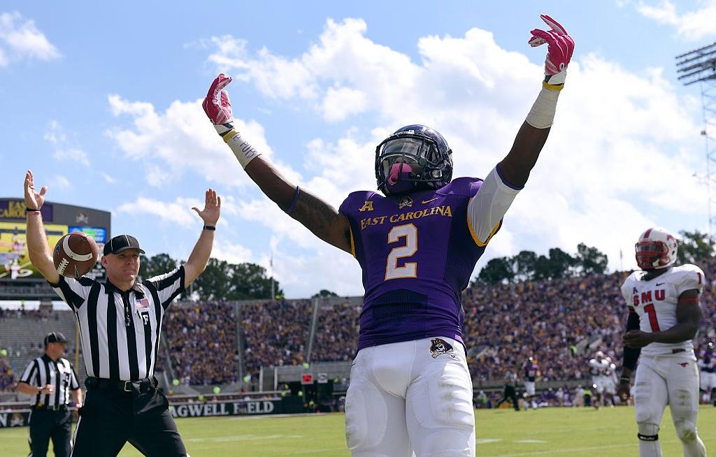 East Carolina's Justin Hardy celebrates a touchdown against SMU