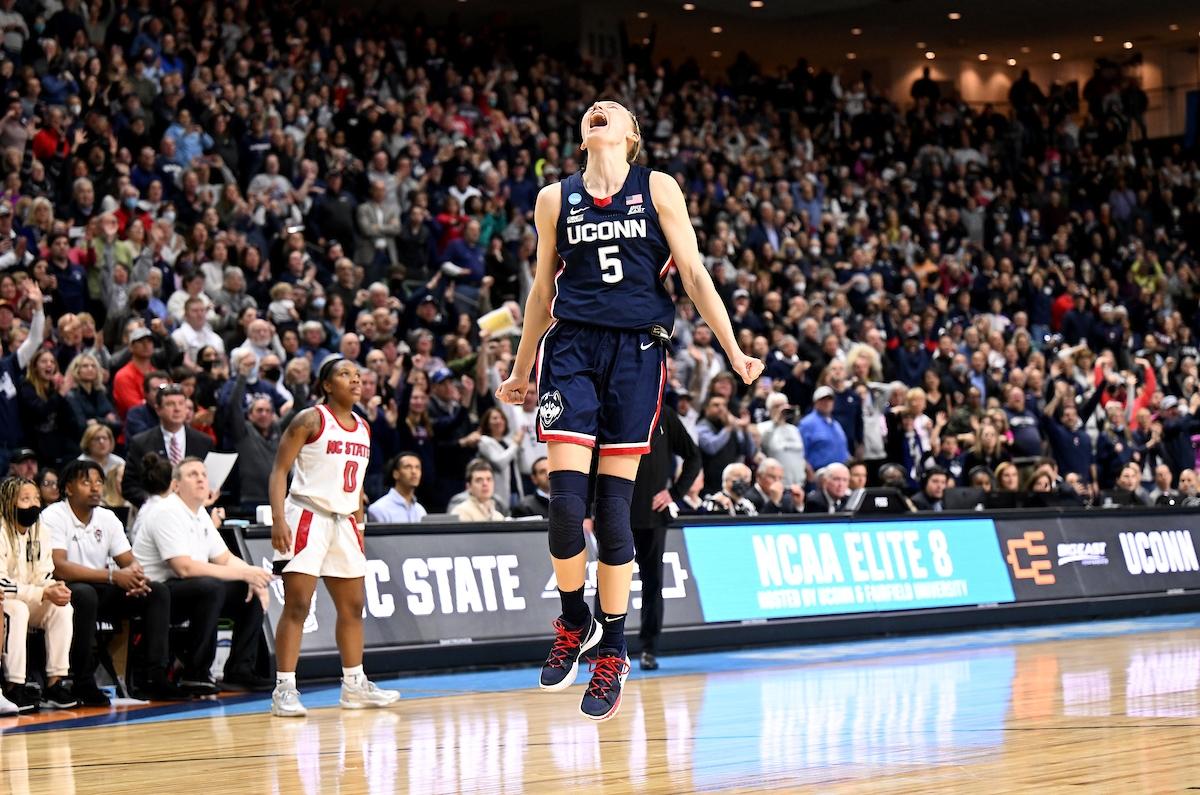 Paige Bueckers celebrates