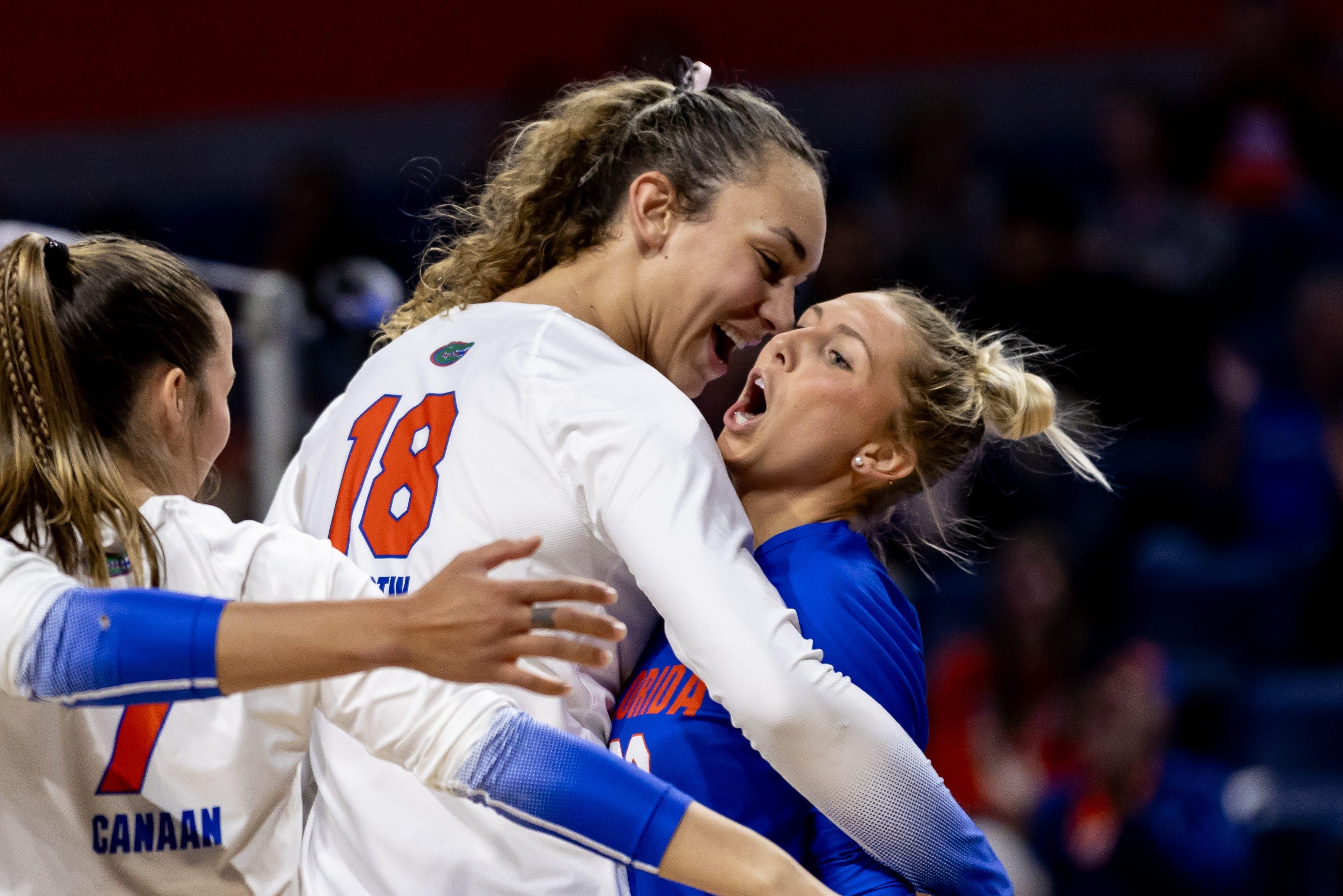 Florida's Kennedy Martin and Elli McKissock embrace after a point