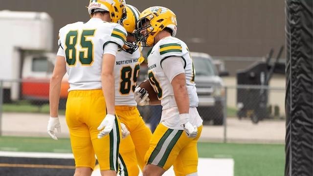 Noah Dobert head butts his teammates after another touchdown. 
