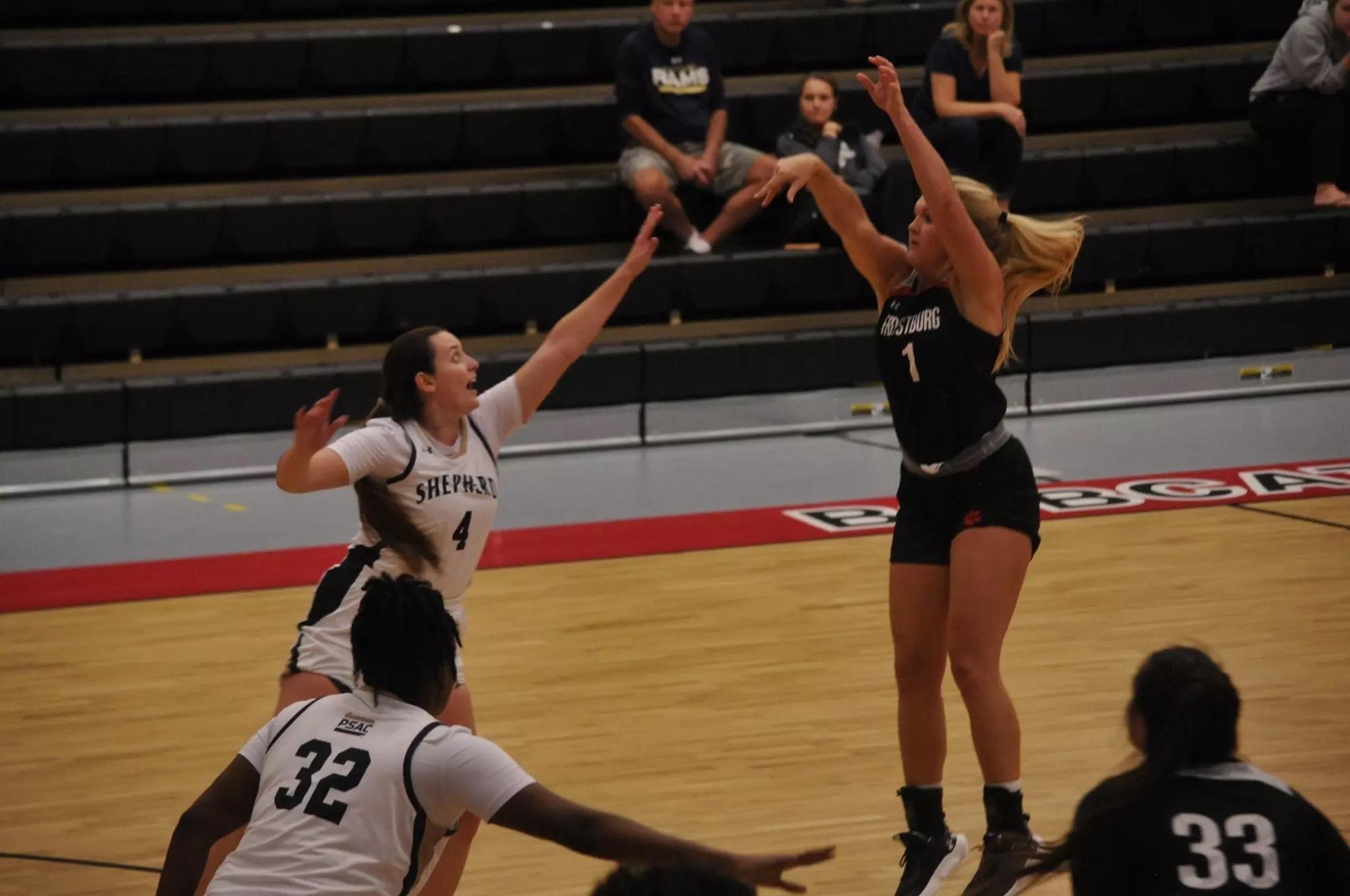 Emilee Weakley scores one her DII women's basketball leading points. 
